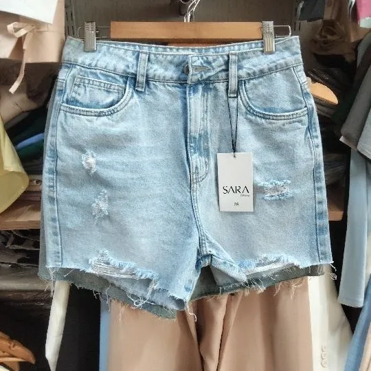 436 short biker rasgado