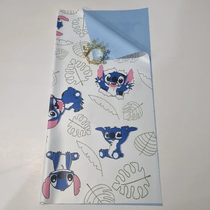 PAQUETE PAPEL COREANO STITCH BLANCO REVERSO CELESTE MATE X 20U