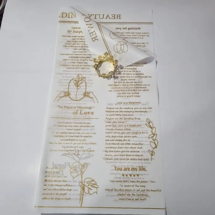 PAQUETE PAPEL COREANOBLANCO LETRAS DORADOS X PAQ(20U) TRASLUCIDO