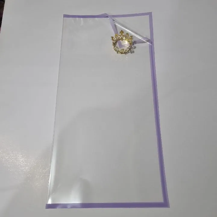 UNIDAD PAPEL COREANO TRANSPARENTE BORDE LILA