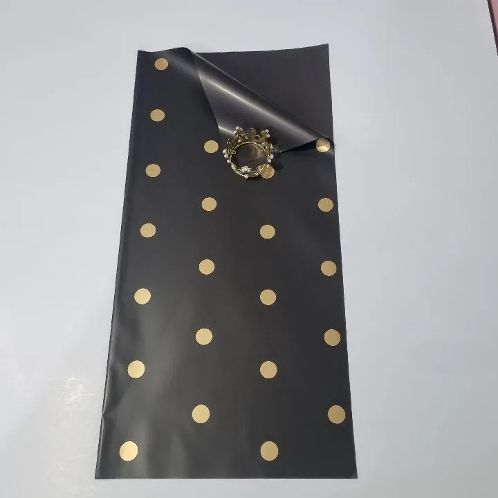 UNIDAD PAPEL COREANO NEGRO CON BOLA DORADAS MATE