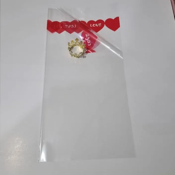 UNIDAD PAPEL COREANO TRANSPARENTES CORAZONES ROJOS