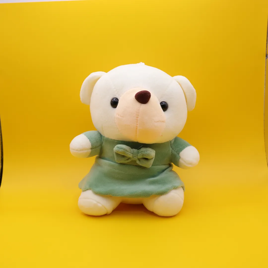 OSITA BLANCA CON BESTIDO Y LAZO 14CM