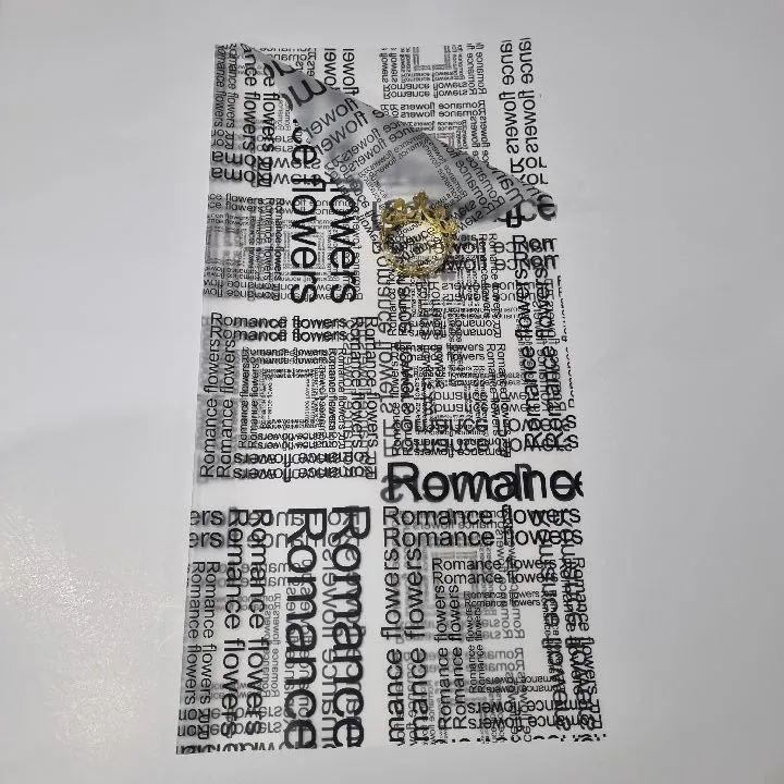 UNIDAD PAPEL COREANO LETRAS NEGRAS TRASLÚCIDO