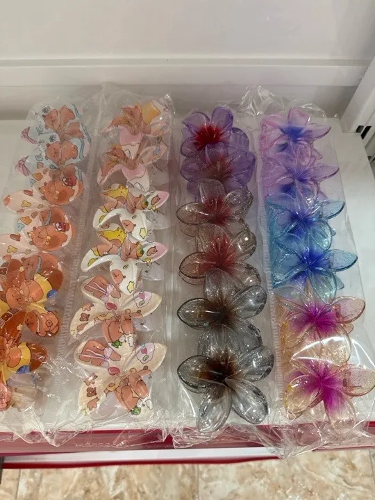 PACK X 12 flores hebillas