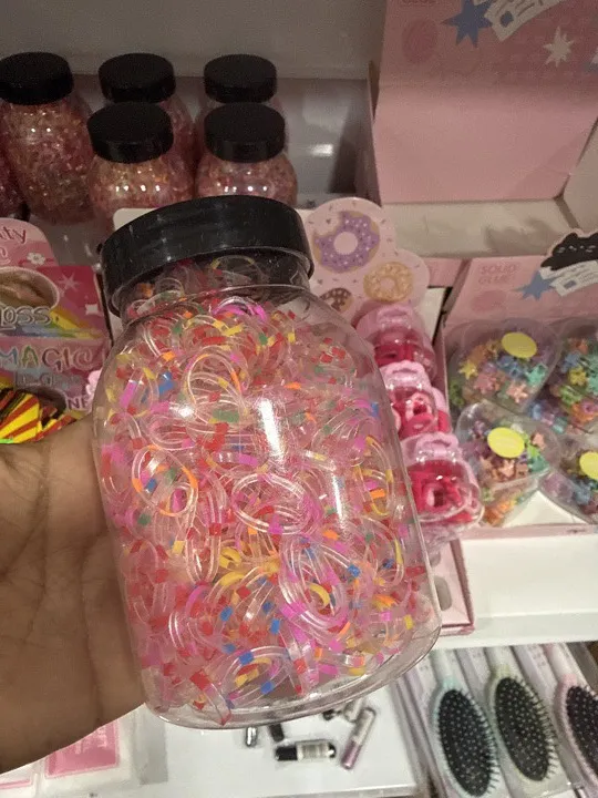 FRASCO CON GOMITAS ELÁSTICAS DE COLORES PEINADO