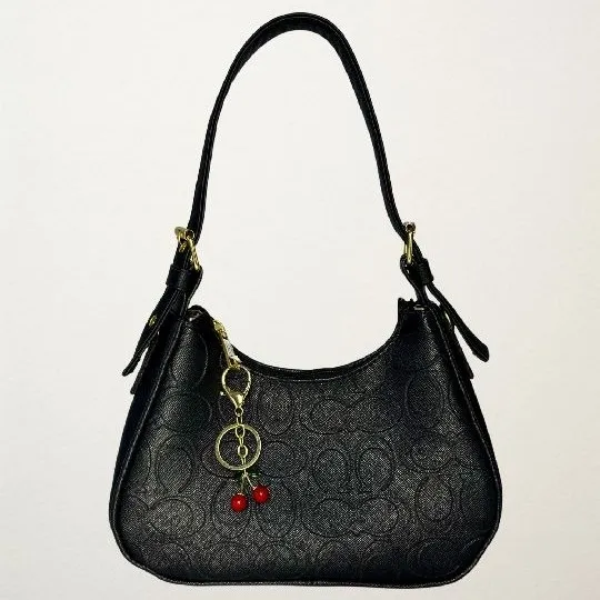 BOLSO COACH REMARCADO CON LLAVERO