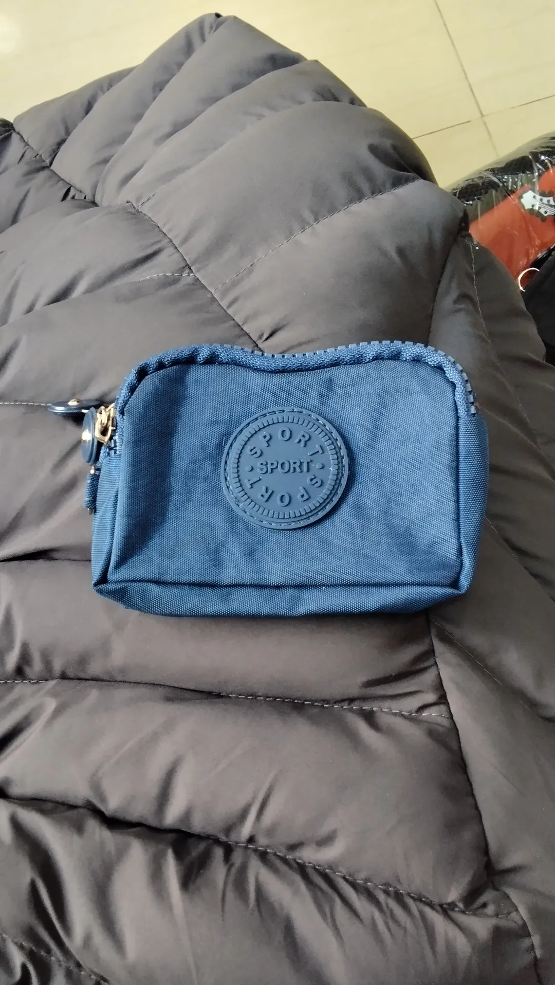 MONEDERO SPORT DOBLE BOLSILLO