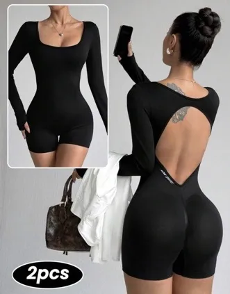 enterizo negro manga larga letras atrás talla S-M